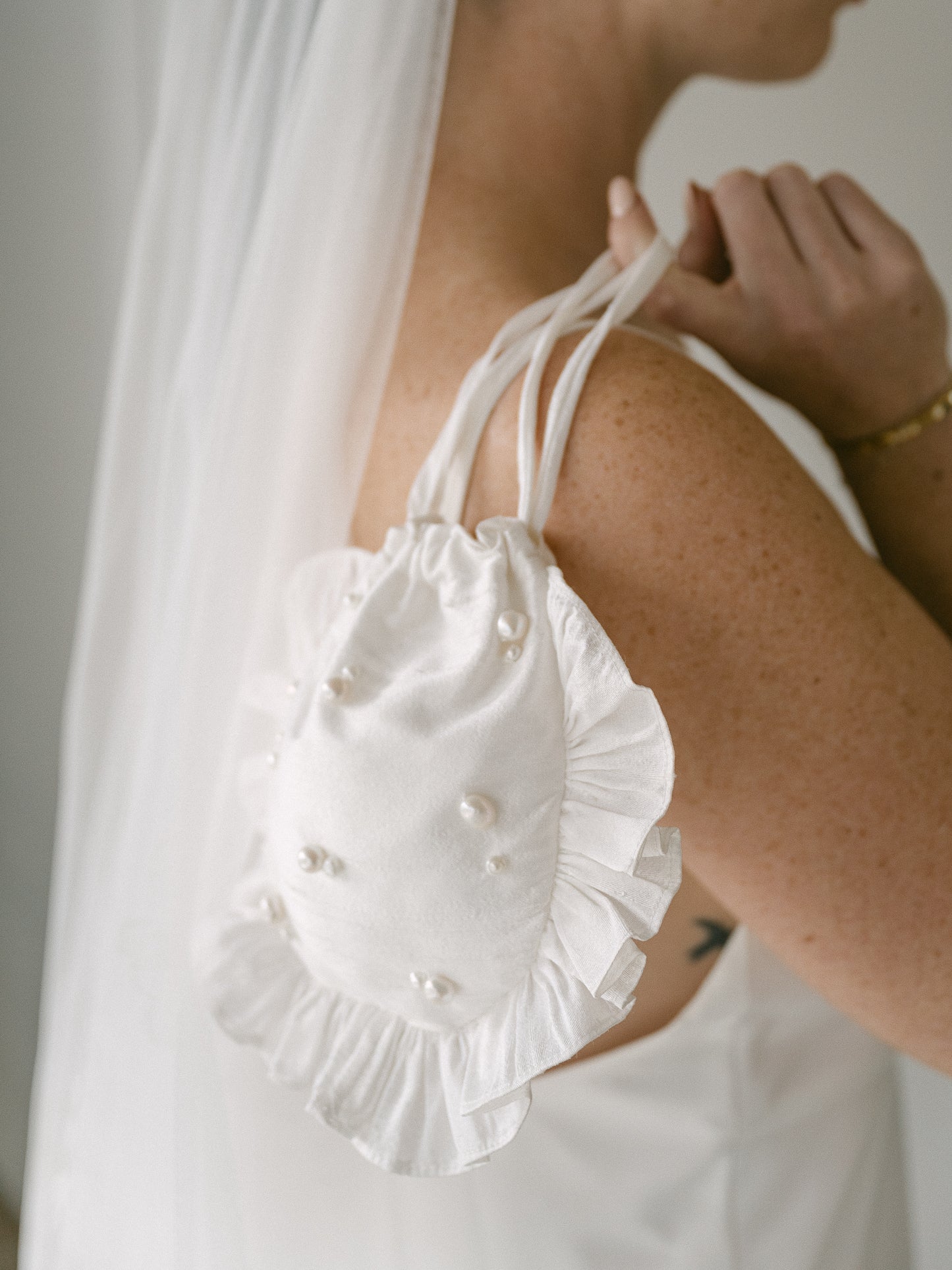 The Pearl Ruffle Wristlet